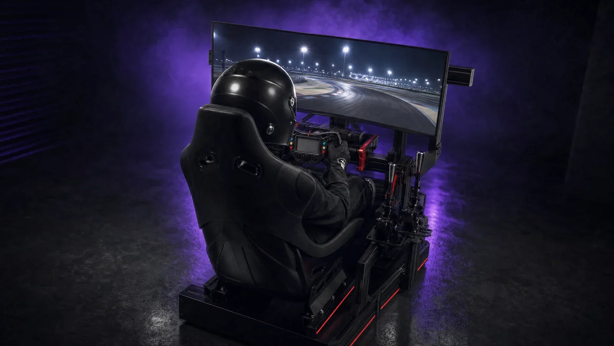 Driver in a black helmet in an aluminum sim racing cockpit
