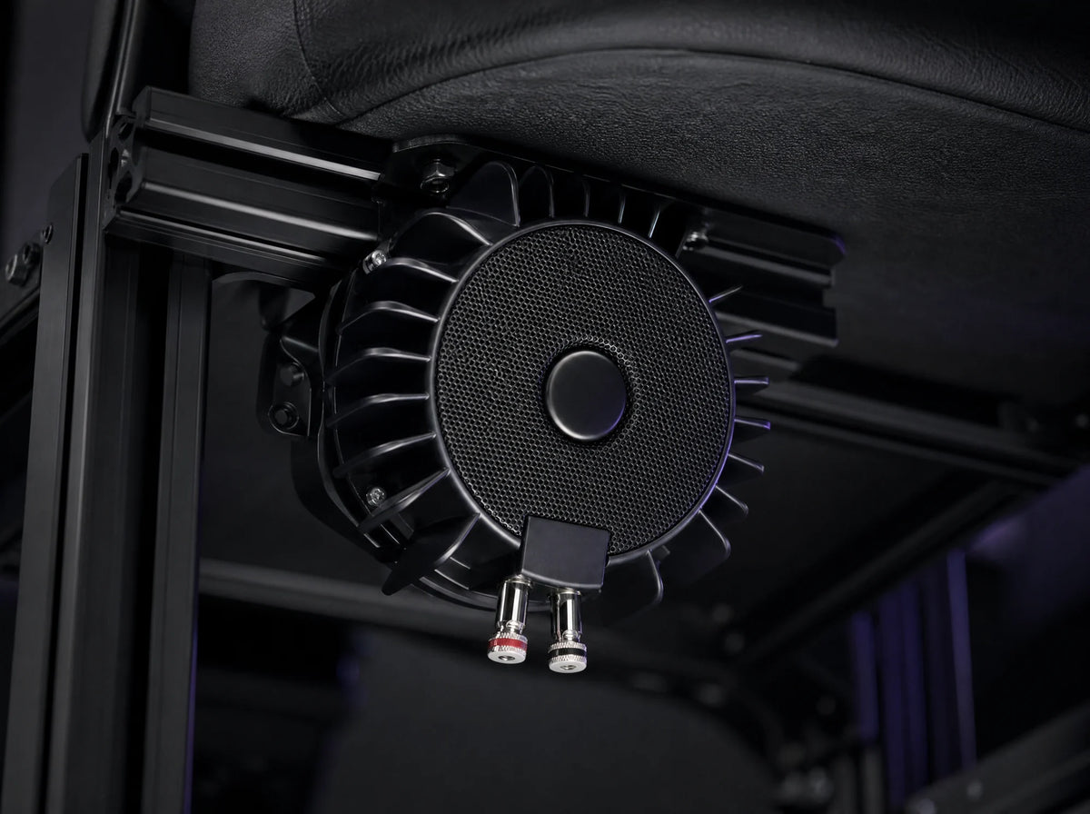 BS-1 bass shaker bolted under a sim rig seat