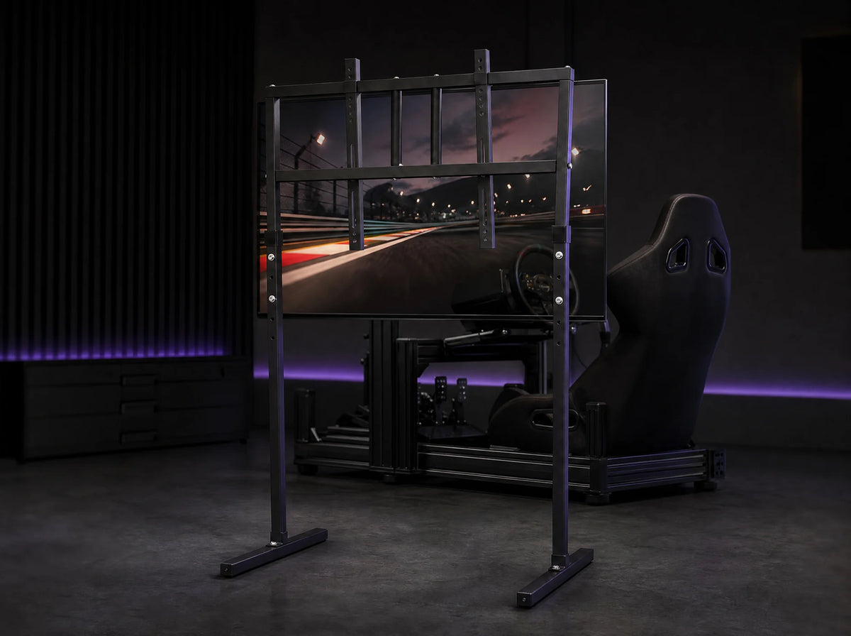 ST-1 holding a TV in front of a sim rig