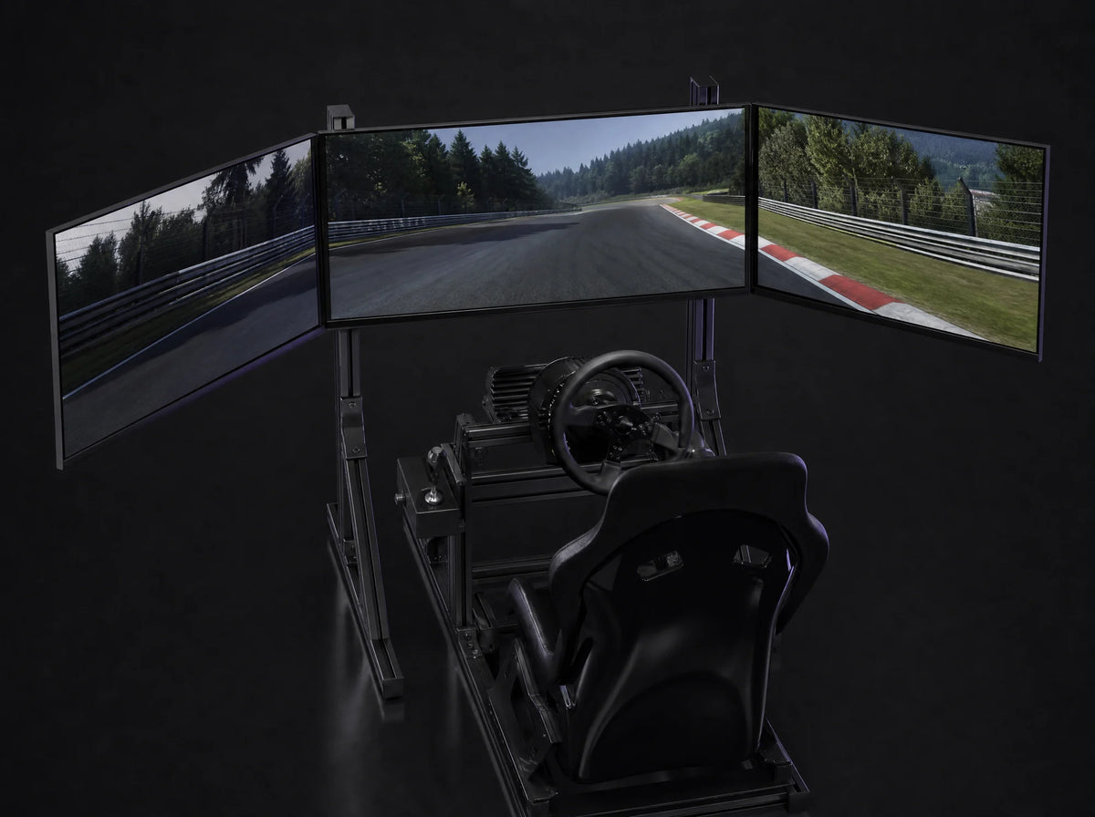 TV-3 with three large screens behind a sim rig